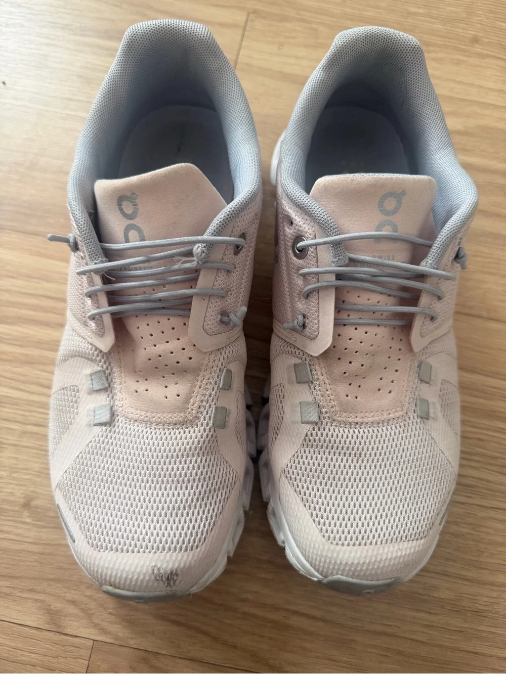 On Running woman’s Athletic Shoes in Pale Pink and Light Gray